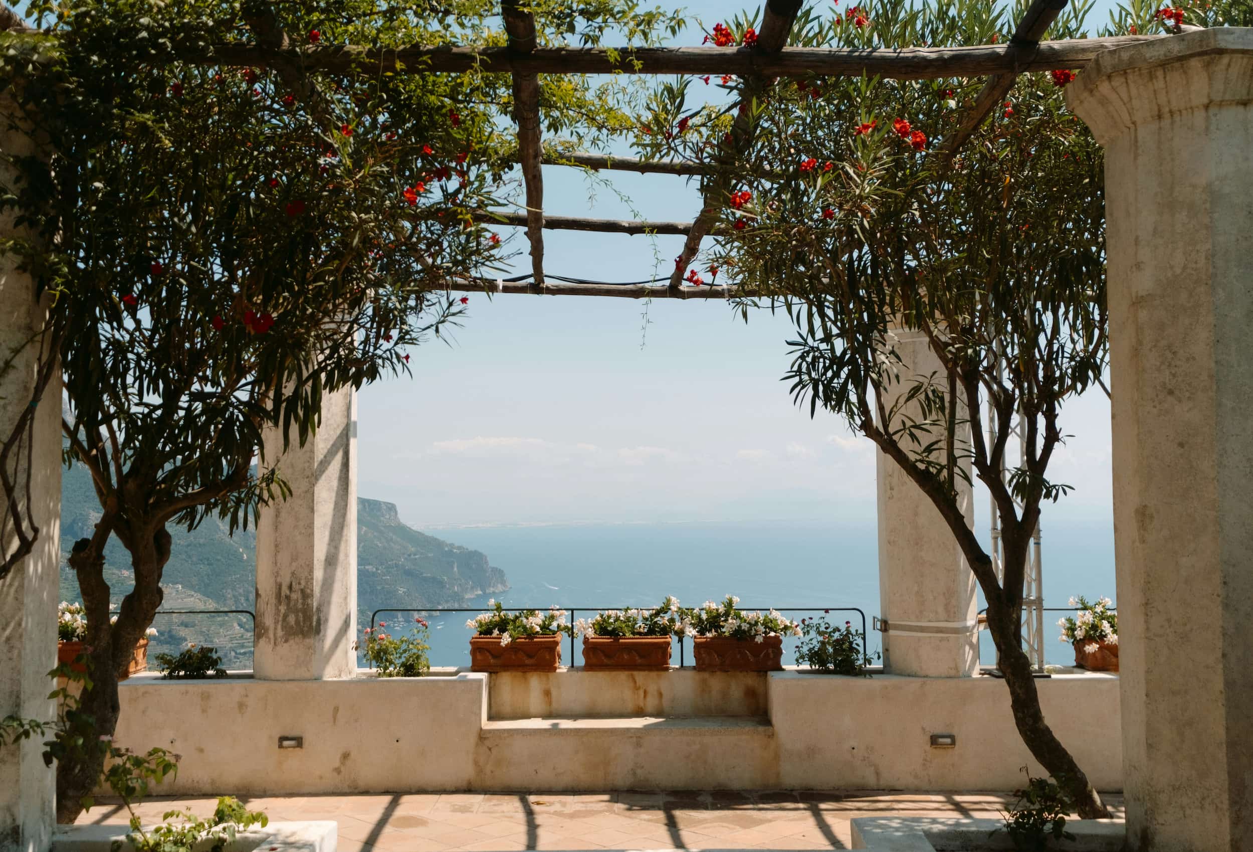 Mediterranean terrace designed to enjoy the outdoors with vegetation and natural shade.